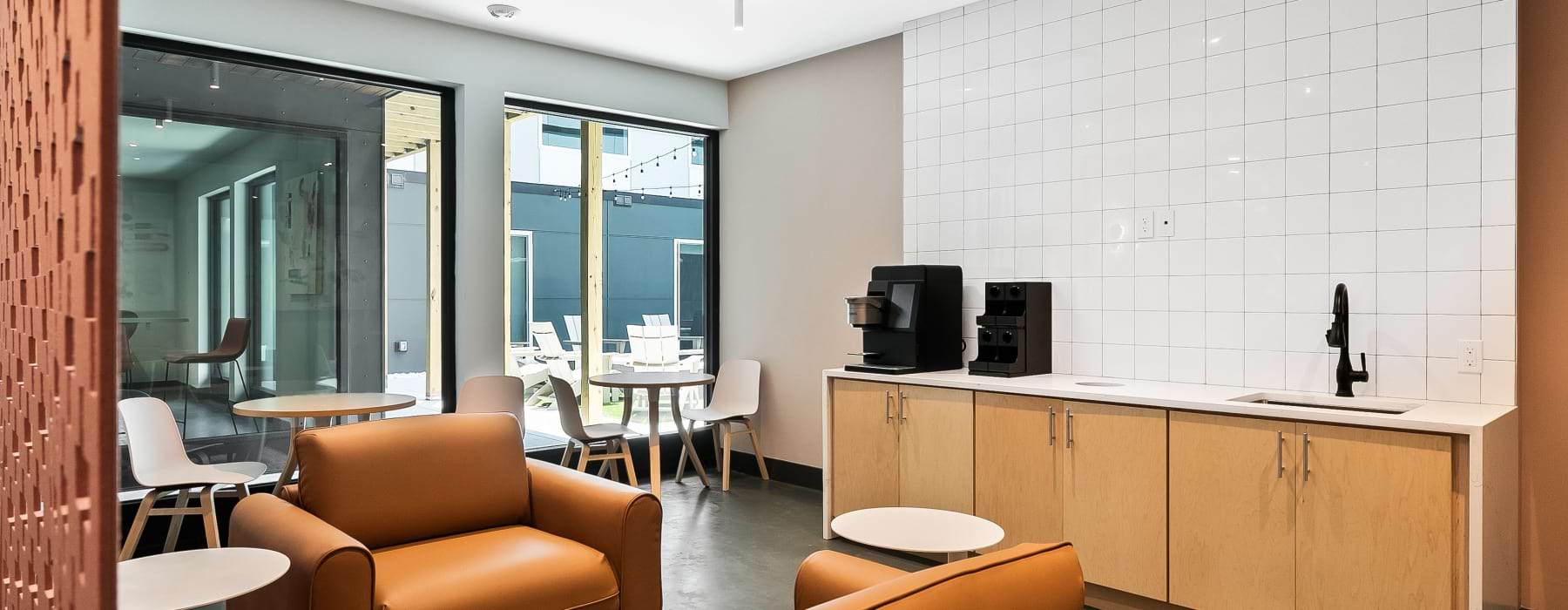coffee lounge with chairs and view of courtyard