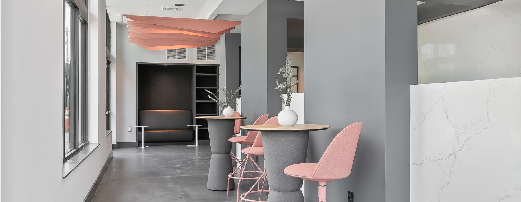 chair and tables in common area