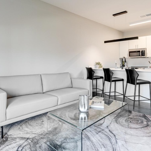 a living room with a couch and a table